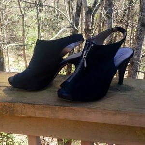 Black suede heels, size 7.